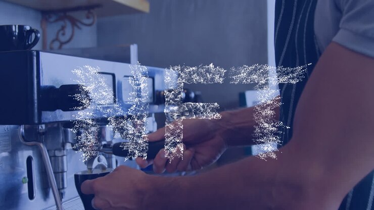 Animation of nft over hands of male bartender preparing coffee