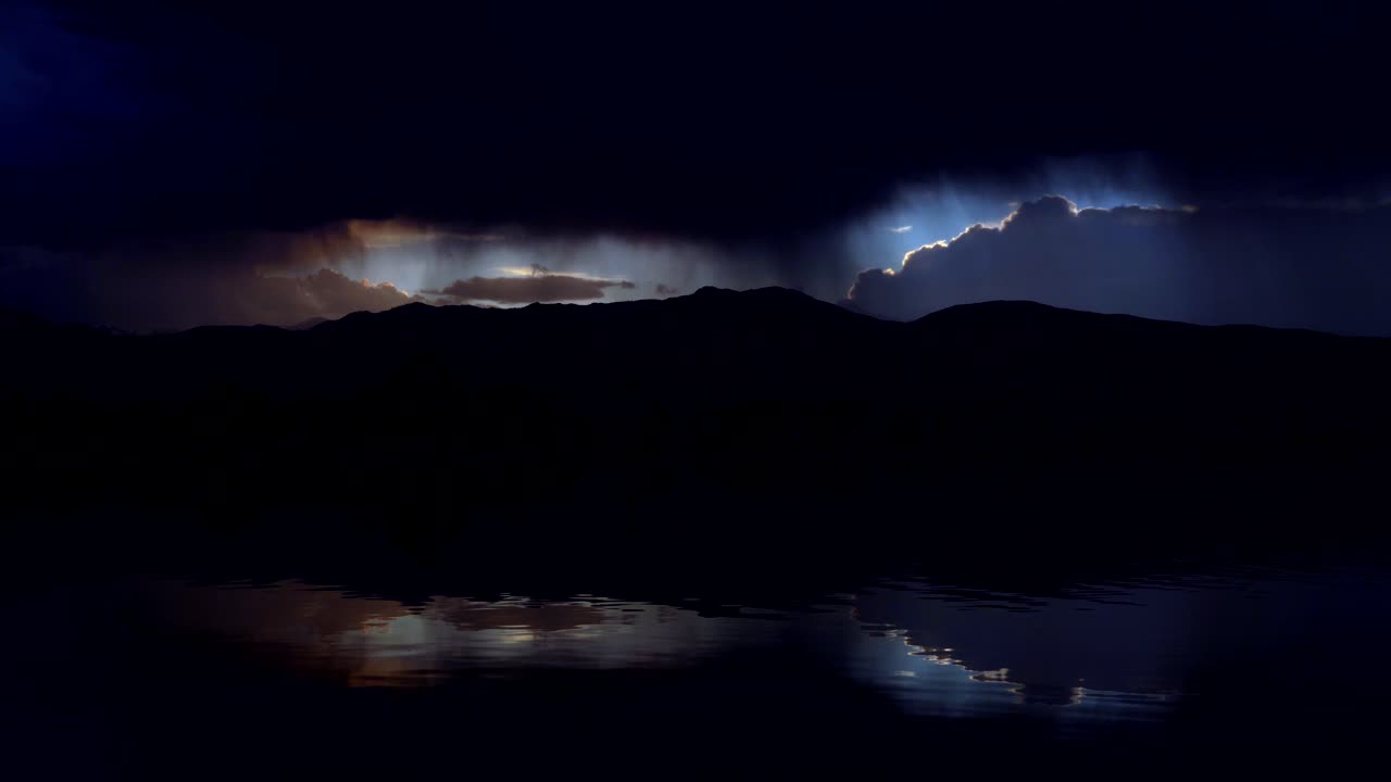 Dramatic sunset and storm clouds over the Coot Lake, Boulder, Colorado