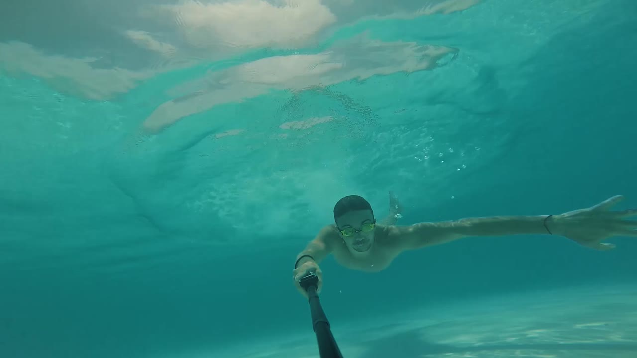 Person Swimming Underwater