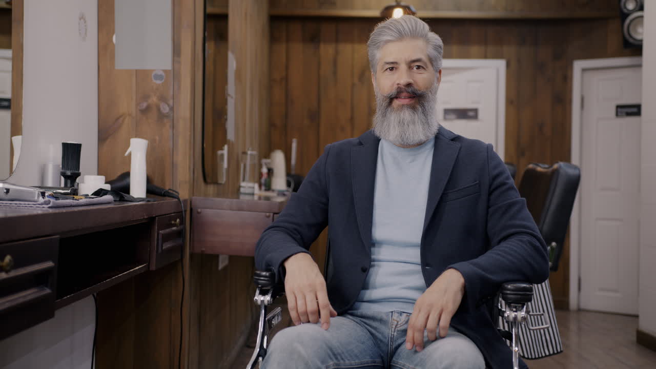 Man Sitting in Barber Chair