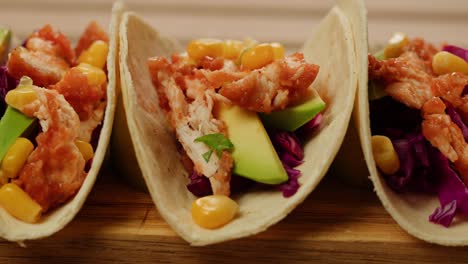 delicious chicken tacos with avocado and corn