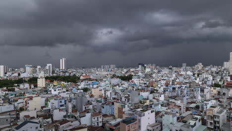 dramatic time lapse of storm clouds over terrace houses, rooftops and narrow alleyways of binh thanh vietnam