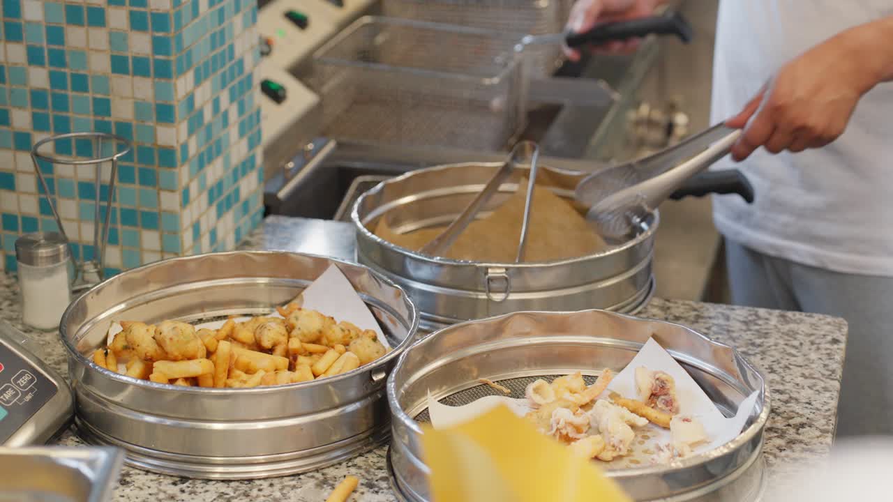 Freshly fried food being served at a fast food restaurant in Genoa, Italy