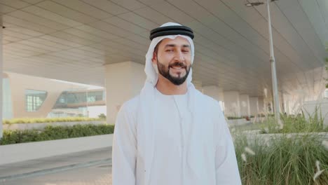 happy emirati man looking at the camera