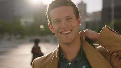 close up portrait of confident young caucasian business man laughing cheerful at camera successful ambitious male wearing stylish fashion in city