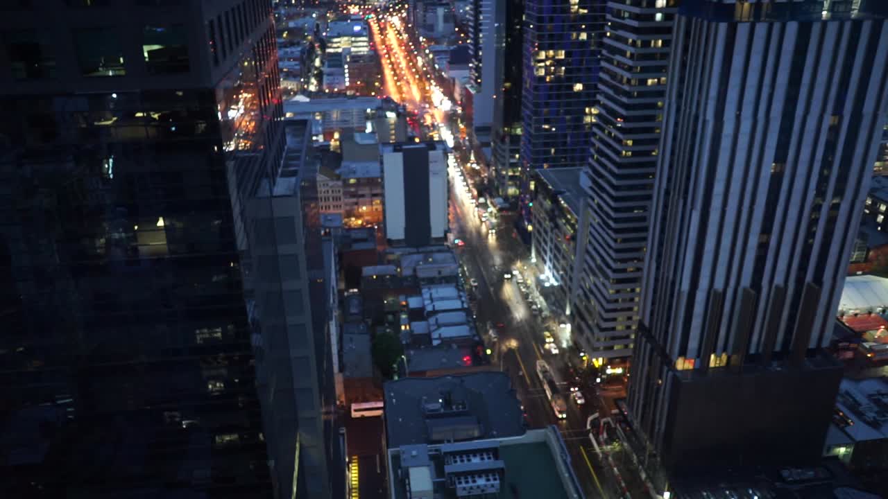 Futuristic Night Traffic View of Elizabeth Street Melbourne City Victoria from above.