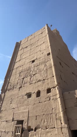 a view of an ancient building ,arc shot, low angle shot