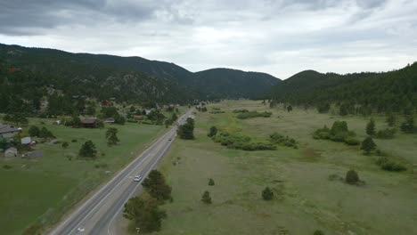 traffic at the highway through estes park town in northern colorado, united states