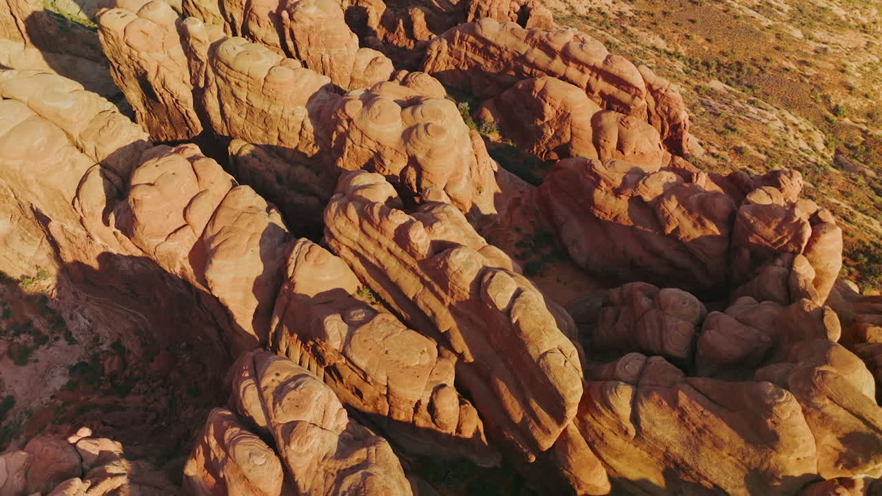 Strangely-shaped rocks in Arches National park in Utah, USA. Circling over a group of weird rocks in Canyons. Top view.