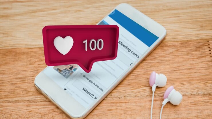 Smart phone with earphones and a message bubble icon with increasing numbers and heart icon for soci