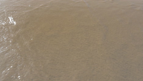 Sea-wave-washing-Brazil-written-on-the-sand