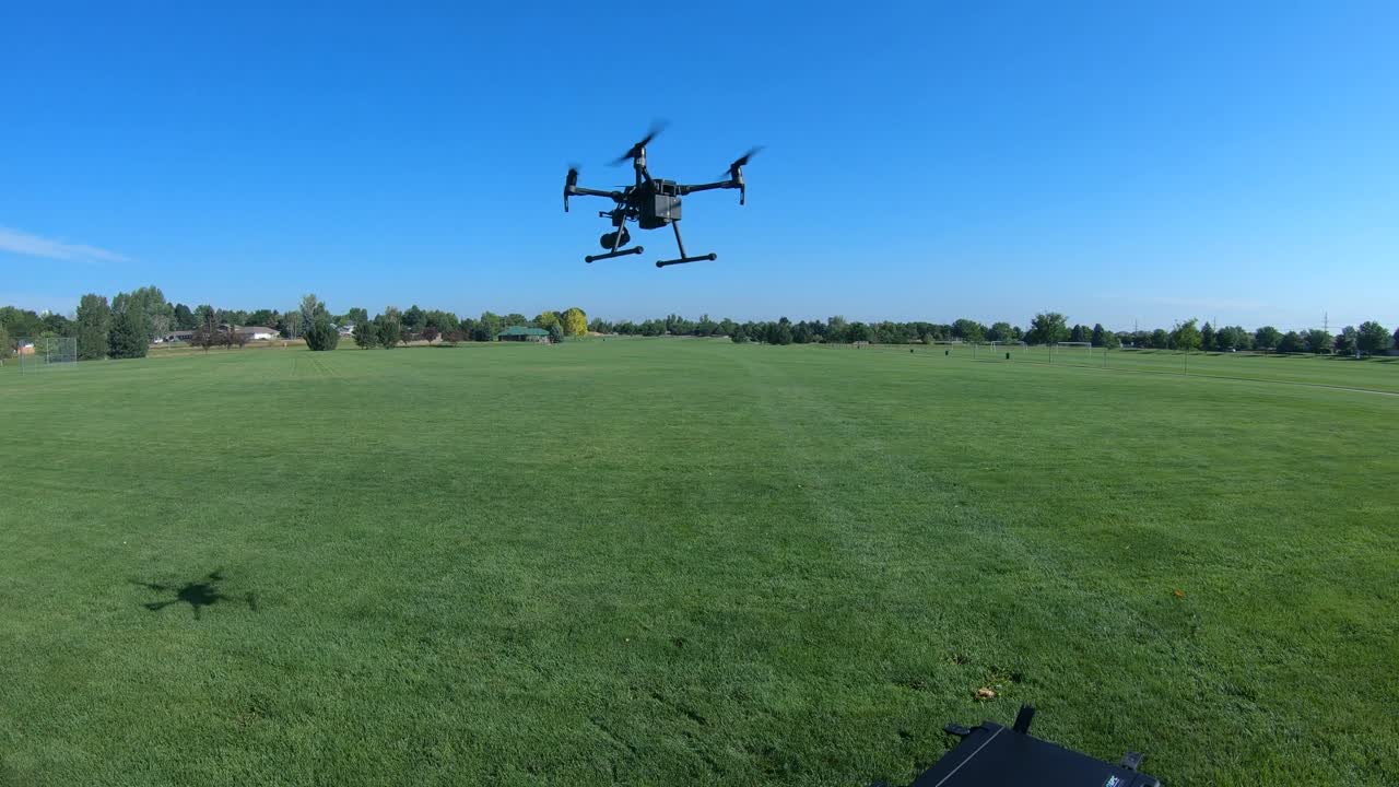 DJI Matrice drone takes off in a park for a demonstration flight