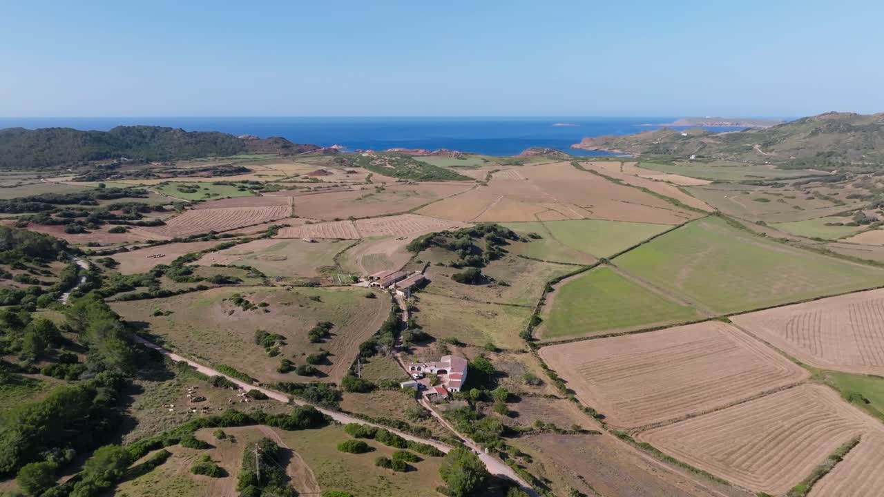 Menorca island rural countryside near Mediterranean seaside, aerial drone landscape Spain