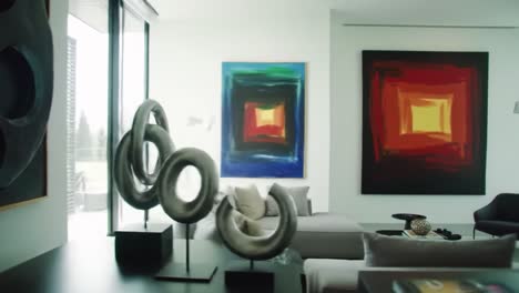 a contemporary living space showcasing dynamic artistic elements with bold colorful paintings and unique sculptures for a sophisticated ambiance
