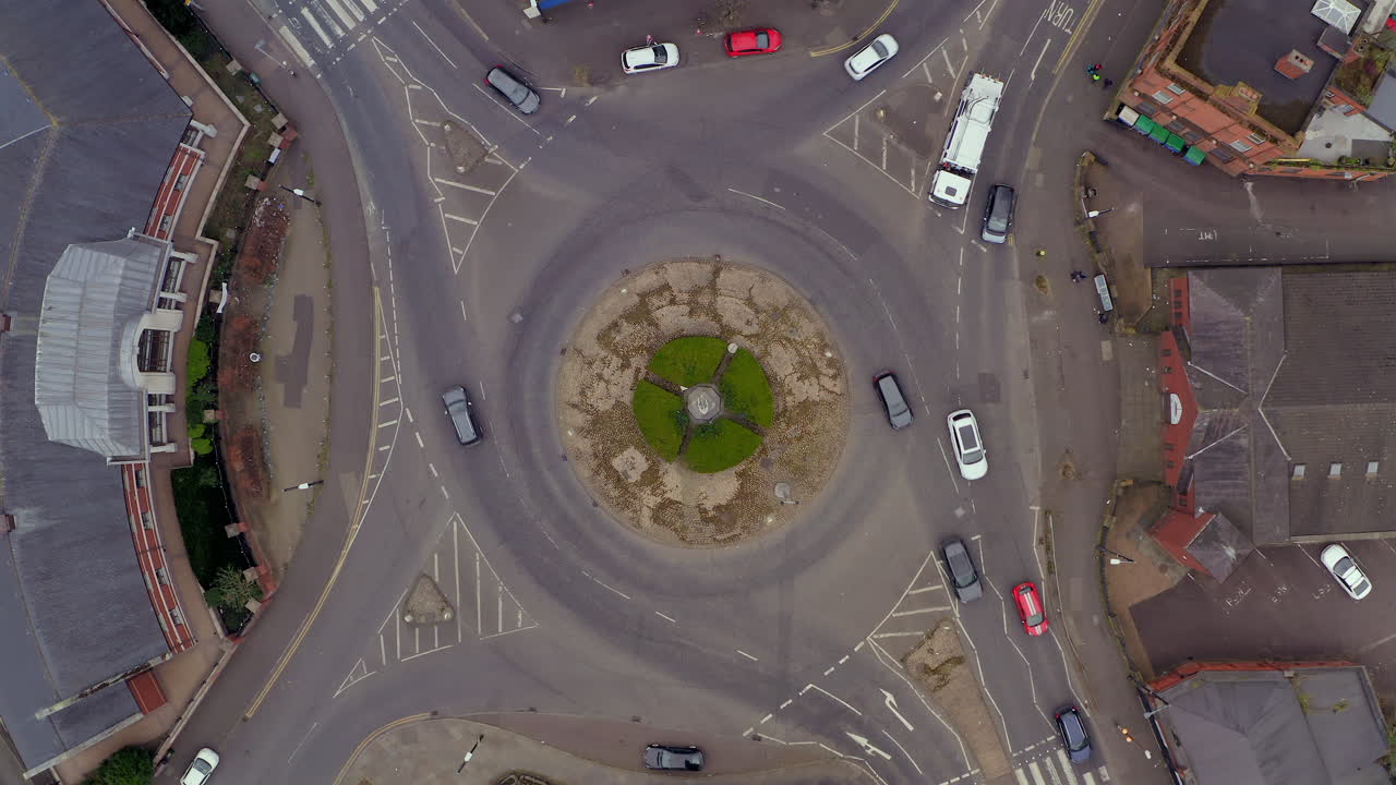 Static top-down aerial of Belfast roundabout, showcasing precise traffic patterns from above
