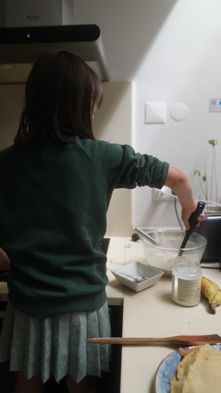 Child Cooking Pancakes