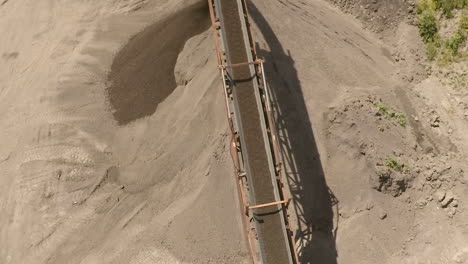 dirt conveyor aerial follow from base to dump