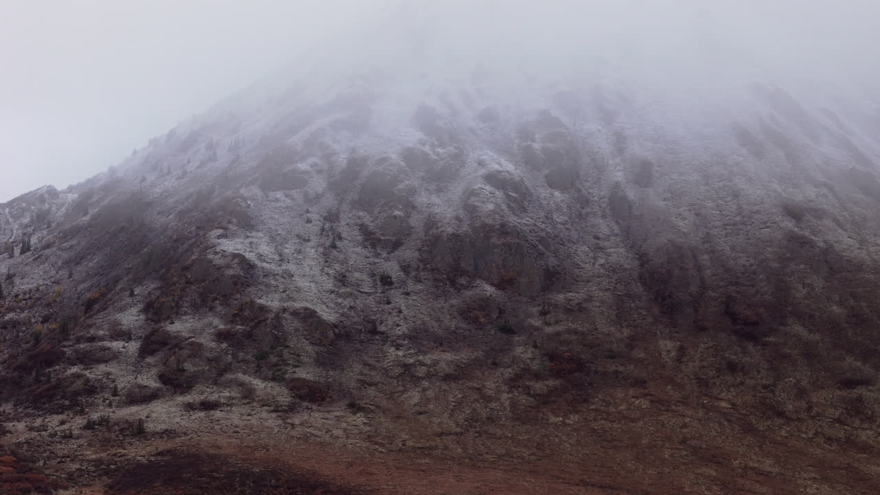 Fog Over Ogilvie Mountains In Yukon Territory, Canada - Drone Shot