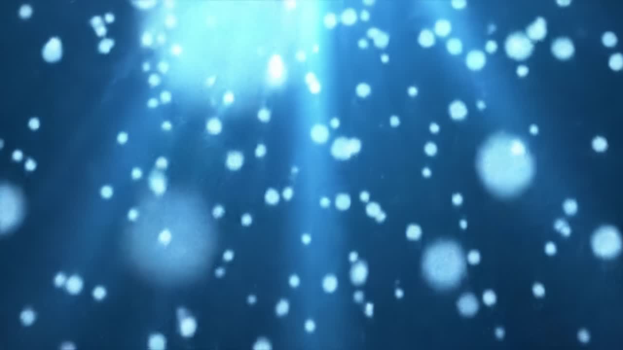 Explore an enchanting underwater world filled with shimmering light particles floating gracefully in serene blue waters. This calming visual showcases the beauty of aquatic life and illumination.