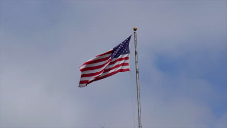 an american flag fluttering in the breeze