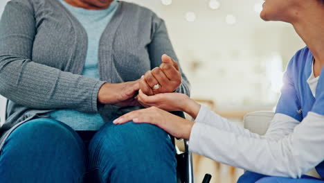 Holding-hands,-old-woman-in-wheelchair