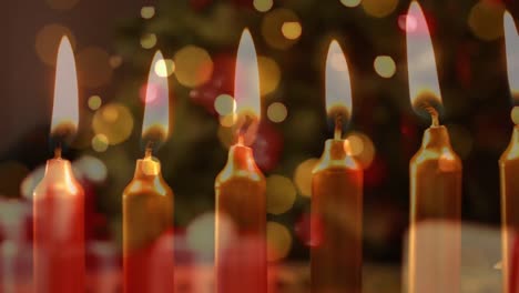 animación de velas sobre el árbol de navidad y regalos