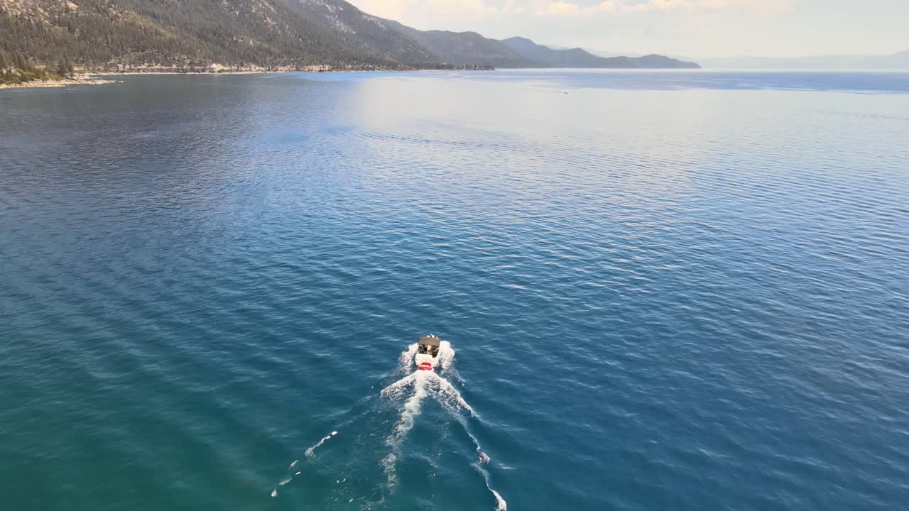 Drone Following Boat on the waters of Lake Tahoe's North Shore near Incline village