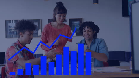 business growth chart animation over diverse team discussing documents in office