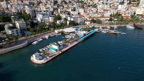 saranda harbor with anchored boats, picturesque pier, and bay views - a must-visit summer vacation destination for travelers