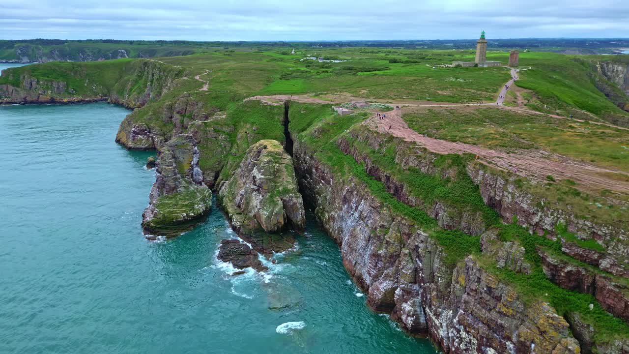 Wonderful drone view of Cap Fréhel peninsula with calm waters on beautiful cliffside and rock formations, Côtes-d'Armor, Brittany, France.