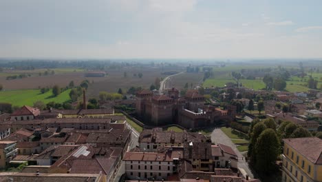 Rocca-Sforzesca-di-Soncino,-Cremona,-Italy,-midday,-autumn,-drone