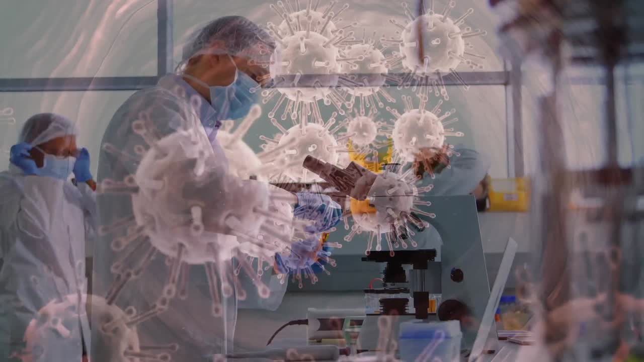 실험실에서 얼굴 마스크를 착용한 사람들에게 코로나바이러스 세포의 애니메이션