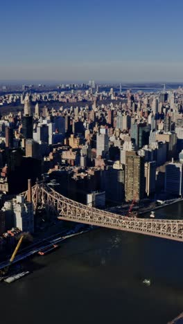 queensboro bridge, manhattan, new york city, during the day in winter