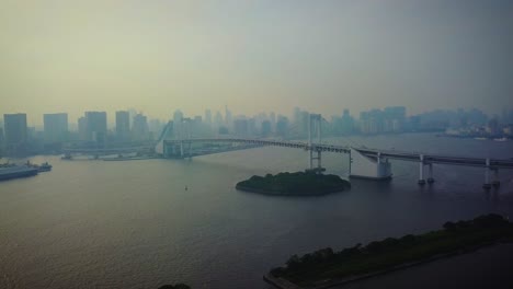 rising on rainbow bridge at day time over water
