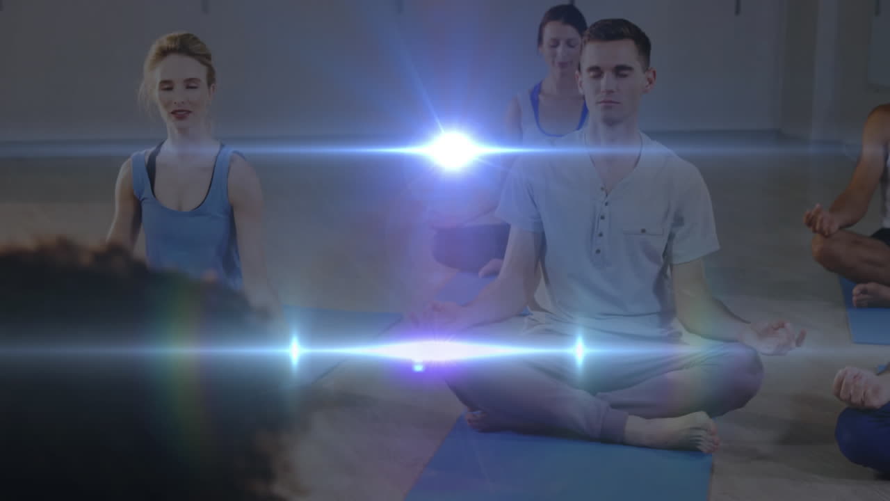 animación de luz brillante sobre personas que practican yoga