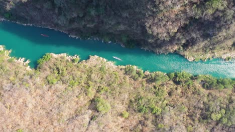 drone flying above mountain river in tamasopo san luis potosi mexico