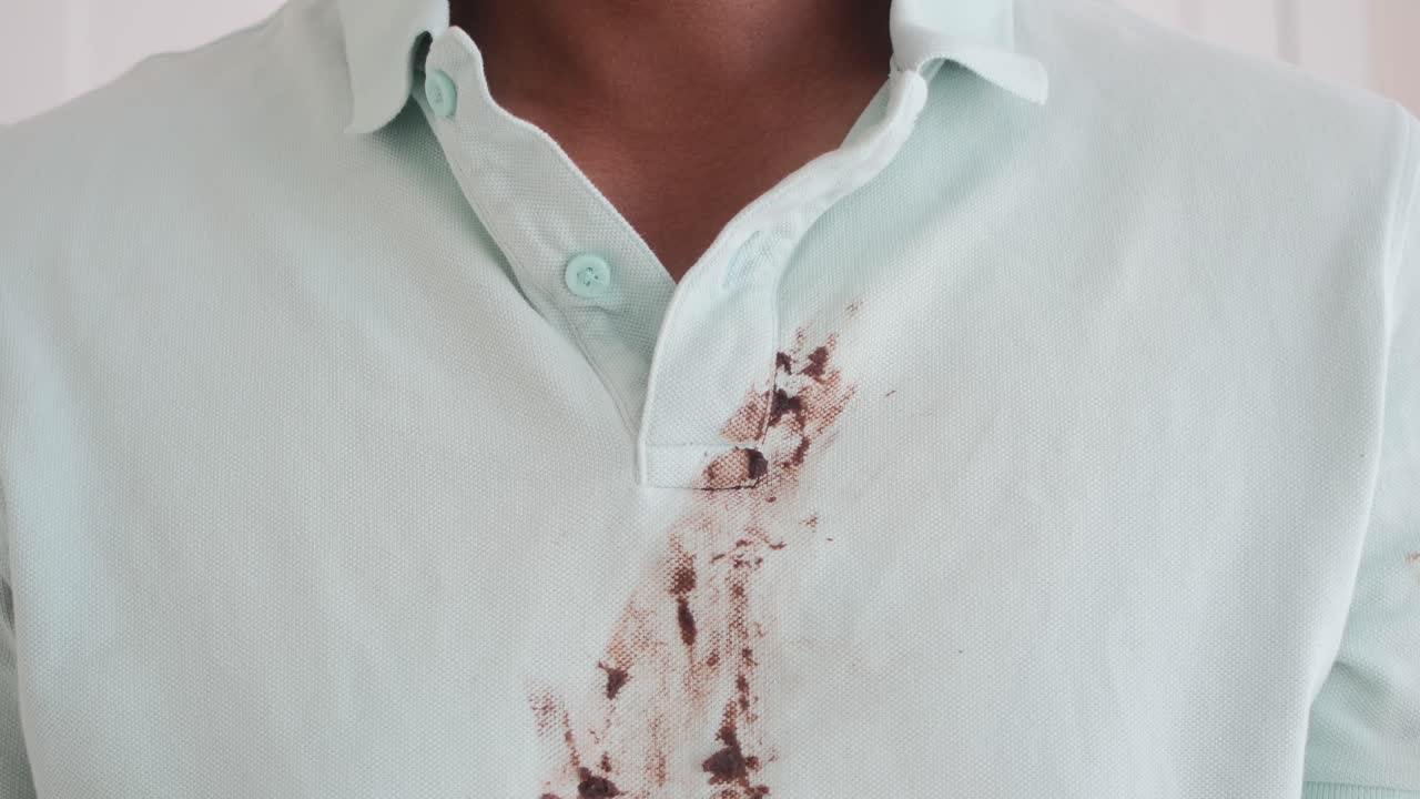 Polo shirt with a stain