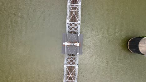 top down shot of a swing bridge on the cumberland river in clarksville, tennessee