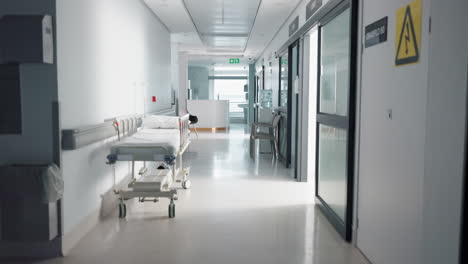 healthcare, clinic and empty hallway with bed