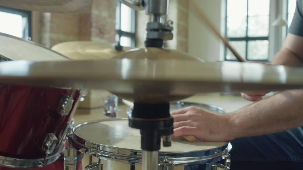 Hands of Musician Playing Drums