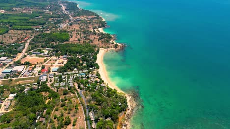 4K-Cinematic-nature-drone-footage-of-a-panoramic-aerial-view-of-the-beautiful-beaches-and-mountains-on-the-island-of-Koh-Lanta-in-Krabi,-South-Thailand,on-a-sunny-day