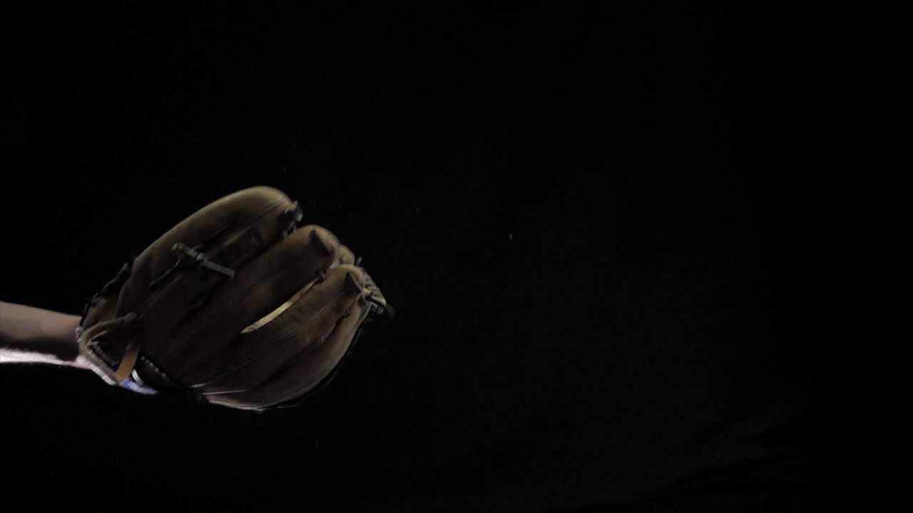 Baseball Glove Catching Pop Fly Baseball in Slow Motion