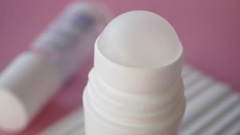 close up of a white roll-on deodorant stick