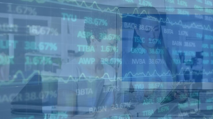 Animation of stock market data processing against two diverse women discussing at office