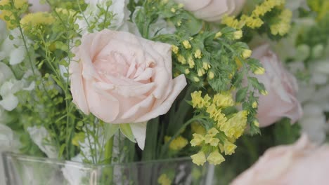 close-up of pink roses in a floral arrangement