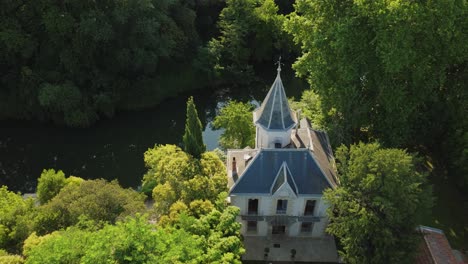 aerial view of picturesque french chateau with pointy roofs displaying timeless beauty and historic charm