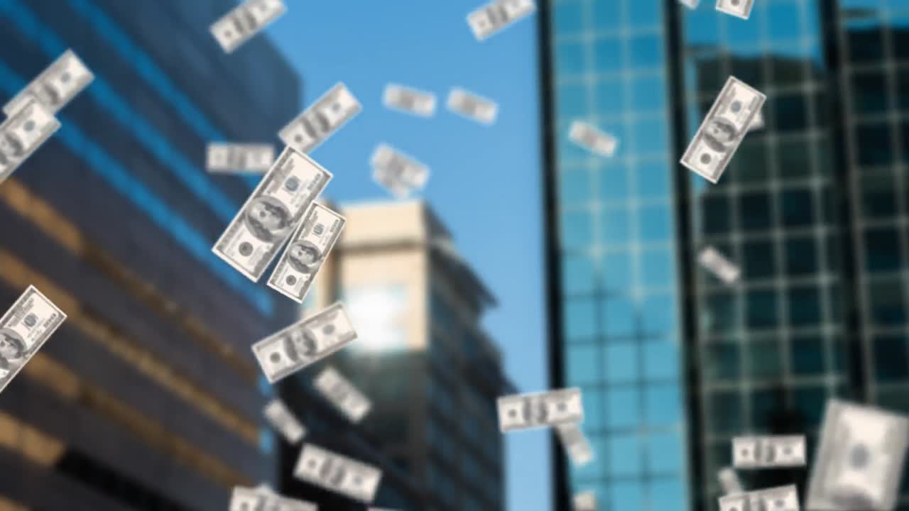 billetes de dólares que caen