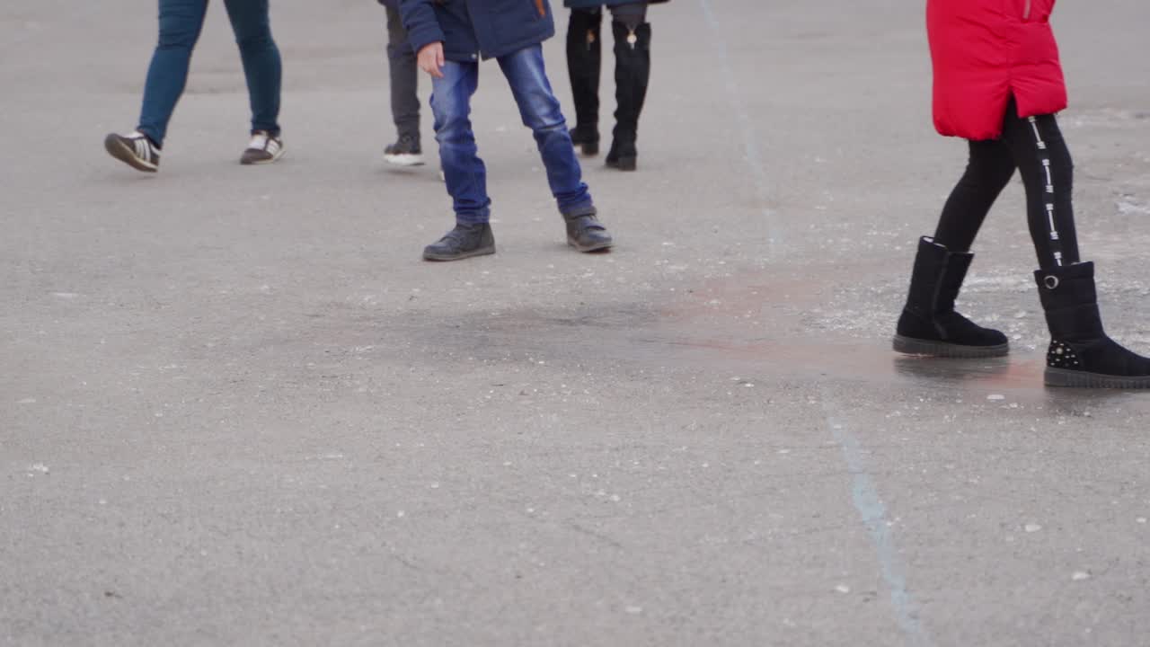 Children Walking on a Playground