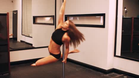 Pole-dancer-practicing-pole-dance