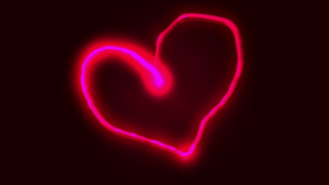 heart trails forming a heart shape against black background